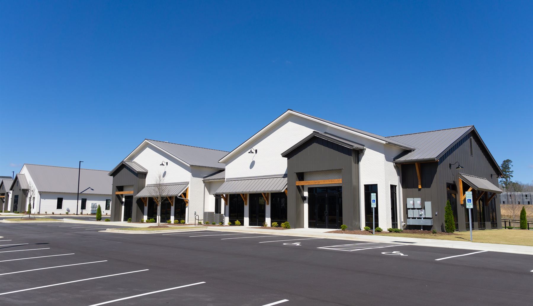 Commercial strip center with fresh parking lot